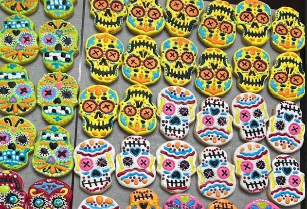 Day of the Dead sugar skull decorated cookies in colorful designs