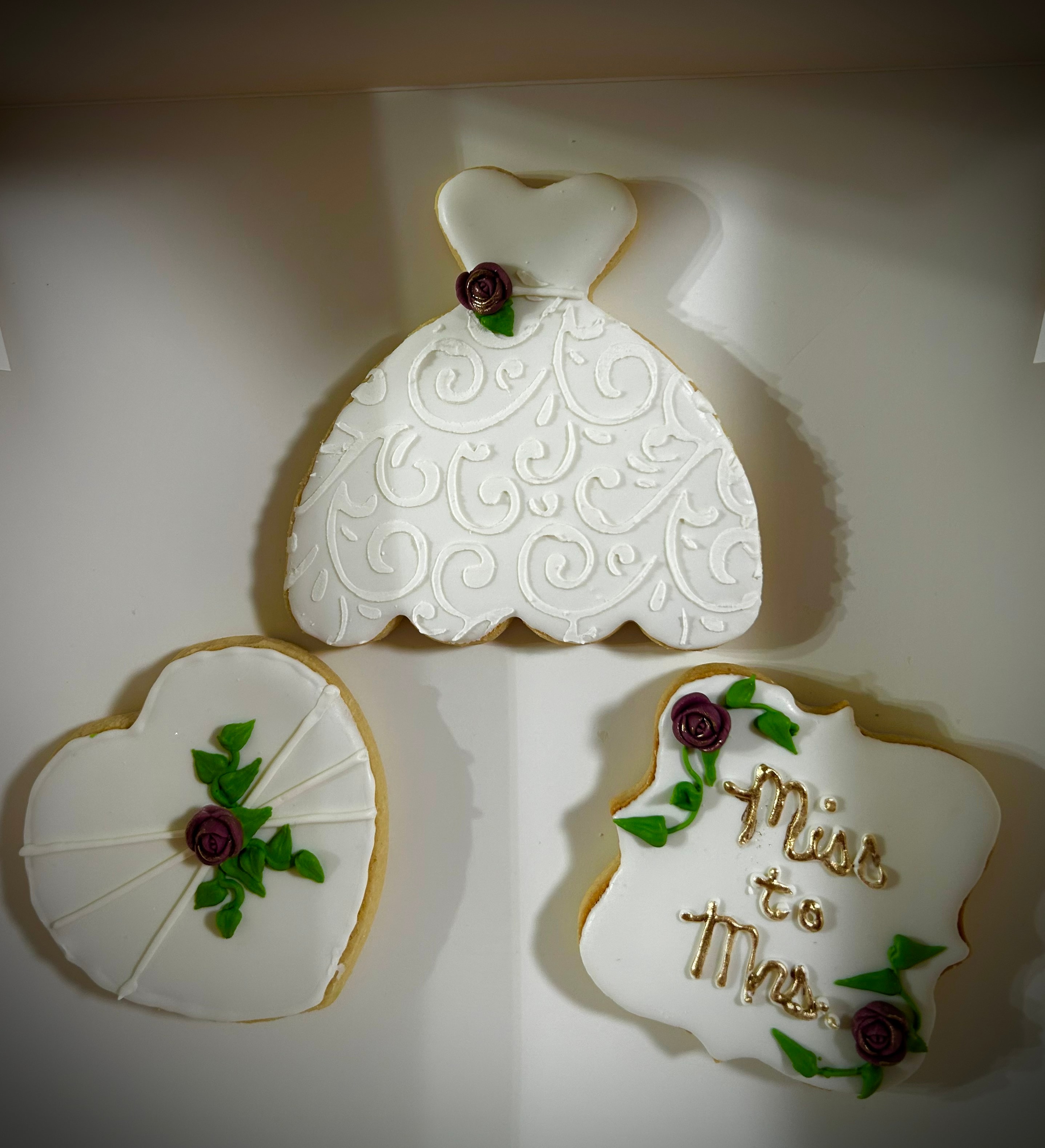 Wedding themed cookies — bridal gown, Miss to Mrs, and heart designs