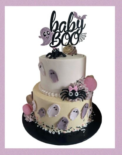 Ghost shaped Halloween cake with white frosting