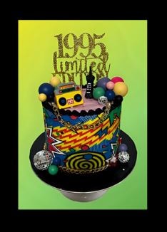 90s themed birthday cake with retro decorations