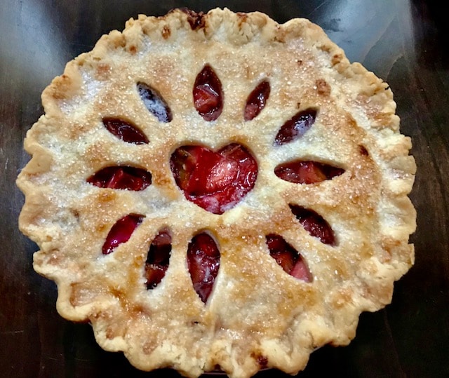 Strawberry rhubarb pie with heart cutout crust