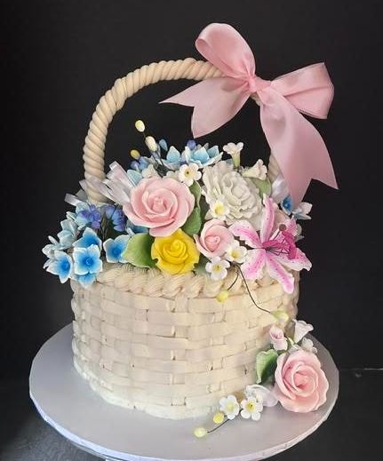 Floral basket cake with sugar roses and butterfly