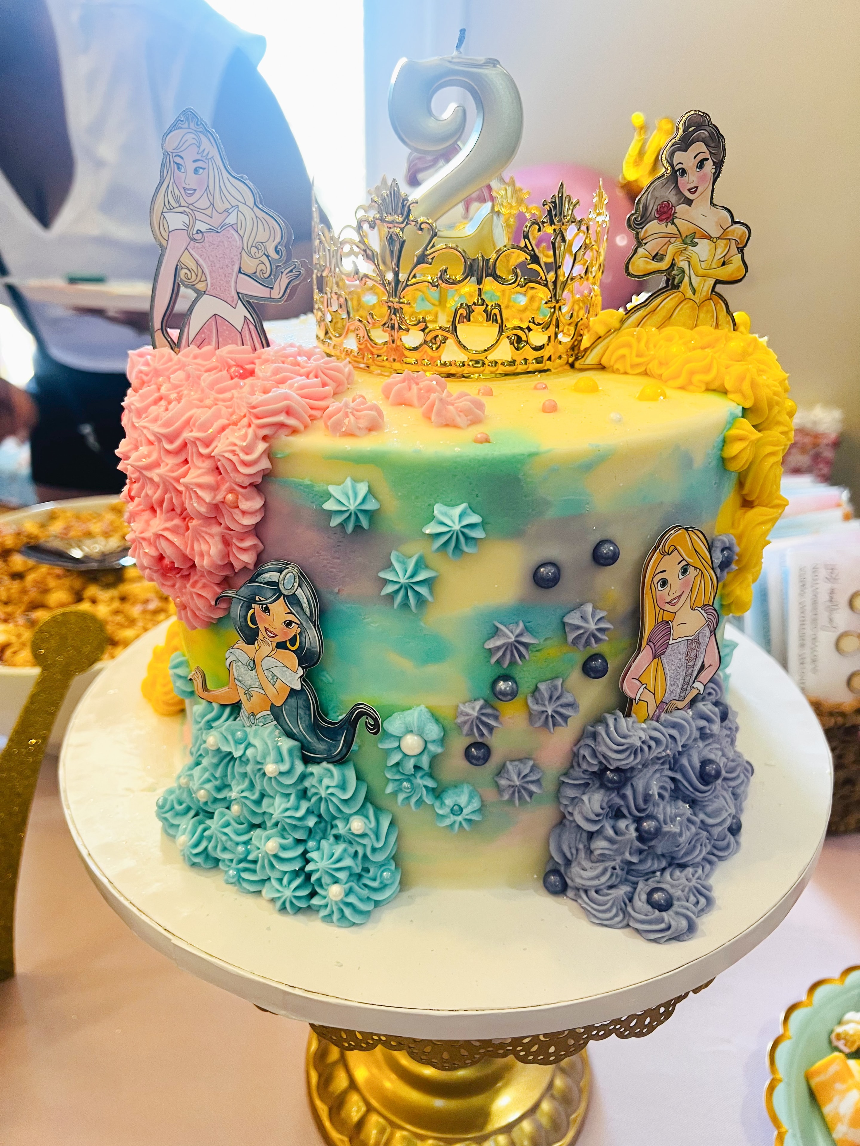 Disney Princess birthday cake with Aurora Belle Jasmine and Rapunzel