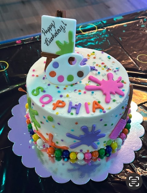 Sophia art-themed birthday cake with paint palette topper