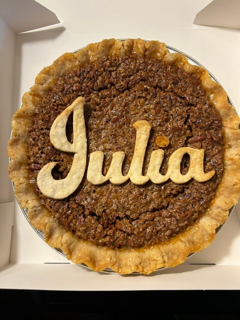 Pecan pie with Julia written in pastry crust