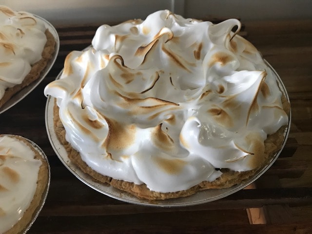 Homemade meringue pie with toasted peaks